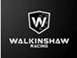 The image shows the Walkinshaw Racing logo on a black background. The logo consists of a stylized "W" inside a shield, with the text "WALKINSHAW RACING" below it in bold uppercase letters.